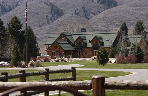 Leah Hogsten  |  The Salt Lake Tribune
Some neighbors believe the large log home on Stringtown Road in Eden, rented by The Summit Group, is operating as a business, and it is locally referred to as "the party house."  Eden residents say daily auto traffic has increased more than three times what it was previously, making the country road an unsafe place for the Valley Elementary school children who walk the road and the others who live on the road and ride their bikes after school. The Summit Group, led by four 20-something entrepreneurs, purchased Powder Mountain ski resort for $40 million with plans to develop 500 homes around a village on the resort's east side.