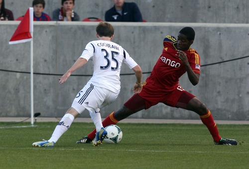 Kim Raff  |  The Salt Lake Tribune
(right) Real Salt Lake forward Olmes Garcia (13) tries to dribbles past (left) Los Angeles Galaxy defender Greg Cochrane (35) during the first half at Rio Tinto in Sandy on April 27, 2013. Real Salt Lake is trailing the Los Angeles Galaxy 2-0 at the half.