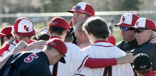 Steve Griffin | The Salt Lake Tribune

Park City head coach Lou Green hugs with his team following a tough loss to Juan Diego at Park City High School in Park City, Utah Wednesday April 24, 2013.
