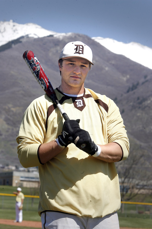 Rick Egan  | The Salt Lake Tribune 

Davis baseball player Jackson Peacock, is have a great season at the plate for the Darts. Friday, April 26, 2013.