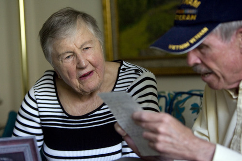 Kim Raff  |  The Salt Lake Tribune
(left) Alice Telford listens as (right) Bill Gillingham reads a letter he wrote to her son, John W. Telford, in 2007 on the 40th anniversary of his death. Telford lost her son, John, in the Vietnam War.  Bill Gillingham, John's old friend and Vietnam veteran, contacted Alice Telford after he saw her in the Salt Lake Tribune back in February. He'd tried to find her since John died.