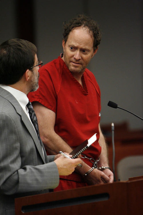 Francisco Kjolseth  |  The Salt Lake Tribune
John Brickman Wall, the ex-husband of a woman found dead in her Sugar House-area home in September 2011, appears at the Matheson Court House April 30, 2013,  alongside attorney Fred Metos for an initial court appearance. The 49-year-old Salt Lake City pediatrician is charged in 3rd District Court with first-degree felony counts of murder and aggravated burglary for the death of 49-year-old Uta Von Schwedler.