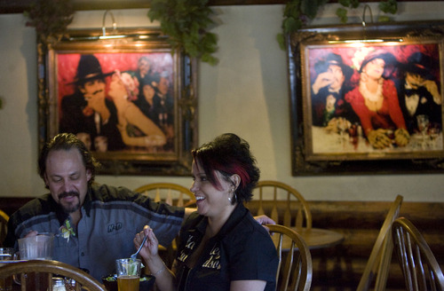 Kim Raff  |  The Salt Lake Tribune
(left) Louis and Tammy Paul eat dinner at The Hog Wallow Pub in Salt Lake City on April 26, 2013.
