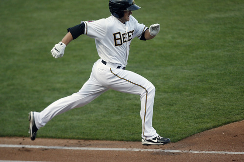 Chris Detrick  |  The Salt Lake Tribune
Salt Lake Bees' Chance Ross (15) runs to first base during the game at Spring Mobile Ballpark Thursday May 2, 2013.