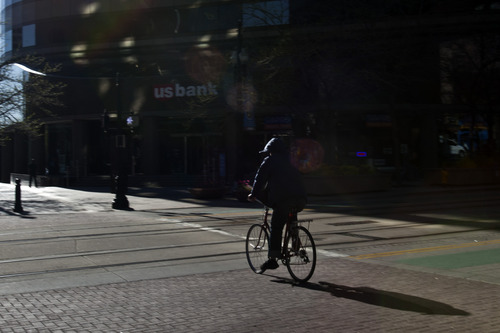 Chris Detrick  |  The Salt Lake Tribune
A biker rides around downtown Salt Lake City Wednesday May 1, 2013.