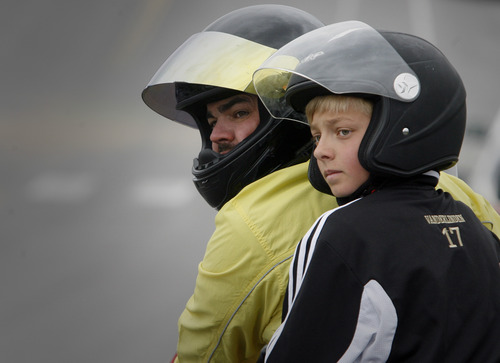 Rick Egan  | The Salt Lake Tribune 

Lead-motorcycle riders, Chad (left) and Kol Vanderlinden (right), await the start of the 5K race, during the Tulip Trot fundraiser for Muir Elementary in Bountiful, Saturday, April 13, 2013.