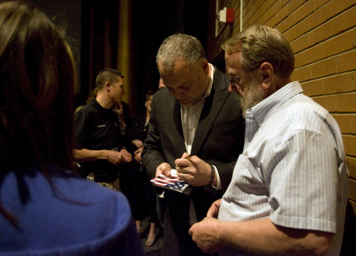 Kim Raff  |  The Salt Lake Tribune
(middle) Actor Vincent Donofrio signs an autograph for a fan after a screening of "Heroes Behind the Badge" at Pleasant Grove High School in Pleasant Grove on April 19, 2013. Donofrio provided the narration for the film.