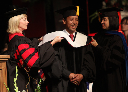 Rick Egan  | The Salt Lake Tribune 

Apa Sherpa receives an honorary Degree at the University of Utah Graduation, at the Huntsman Center, Thursday, May 2, 2013.