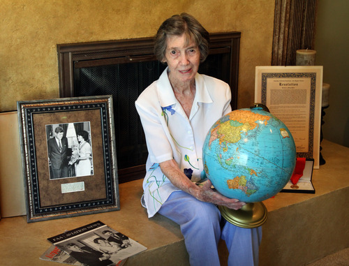 Rick Egan  |  The Salt Lake Tribune
Bountiful resident Betty Miller with globe and reports of her 1963 aviation feat. She was the first woman to fly solo across the Pacific Ocean. This month marks the 50th anniversary of the 87-year-old's historic flight.