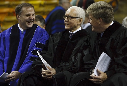 Leah Hogsten  |  The Salt Lake Tribune
Sen. Orrin Hatch, center, and Nike Brand President Charlie Denson, right, a Utah State alumnus, were given honorary degrees during USU's commencement at the Dee Glen Smith Spectrum in Logan, Saturday, May 4, 2013.
