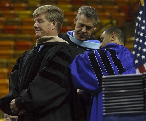 Leah Hogsten  |  The Salt Lake Tribune
Nike Brand President Charlie Denson, a Utah State University alumnus, received an undergraduate degree during commencement at the Dee Glen Smith Spectrum in Logan, Saturday, May 4, 2013.