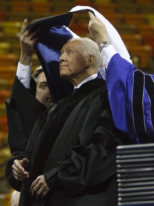 Leah Hogsten  |  The Salt Lake Tribune
U.S. Sen. Orrin Hatch receives an honorary degree during Utah State University's commencement at the Dee Glen Smith Spectrum in Logan, Saturday, May 4, 2013.