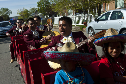 Chris Detrick  |  The Salt Lake Tribune
Jose Luis Orozco and other members of the Sol de Jalisco Mariachi perform in the 26th annual Cinco de Mayo parade near Midvale City Park Saturday May 4, 2013.