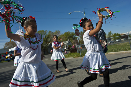Chris Detrick  |  The Salt Lake Tribune
Girls from Real Academia de Ballet dance in the 26th annual Cinco de Mayo parade near Midvale City Park Saturday May 4, 2013.