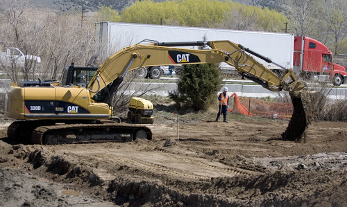 Paul Fraughton  |  Tribune file photo
Heavy equipment works last month in the area where diesel fuel from a Chevron pipeline was spilled on March 18. Chevron has received approval to restart the pipeline at full force after it passed a stress test on Thursday.
