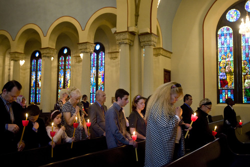 Kim Raff  |  The Salt Lake Tribune
Parishioners attend the Agape Vespers service, which culminates the end of Holy Week festivities for the Orthodox Christian faith, at the Holy Trinity Cathedral in Salt Lake City on May 5, 2013. They hold candles throughout the service that represent the light of Christ.