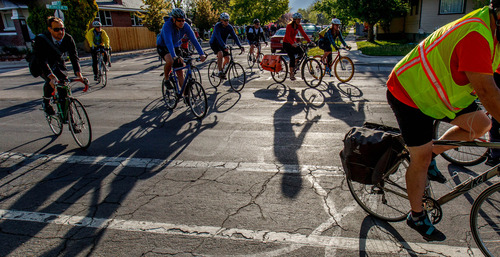 Trent Nelson  |  The Salt Lake Tribune
Cyclists on the annual Mayors' Bike to Work Day, Tuesday May 7, 2013.