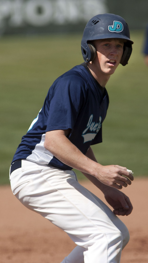 Steve Griffin | The Salt Lake Tribune


Juan Diego Catholic High School second baseman, Alex Gudac, runs the bases during practice at the Draper, Utah high school Tuesday May 7, 2013.