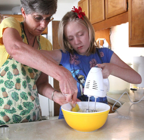 Rick Egan   |  The Salt Lake Tribune
Merri Lou Ericson and granddaughter Ashley Janzen, 12, cook Swedish pancakes. Ericson learned the recipe four decades ago to please her new husband.