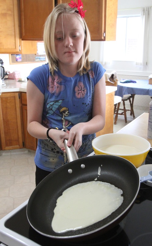 Rick Egan  |  The Salt Lake Tribune
Ashley Janzen, 12, cooks Swedish pancakes at her grandmother's house, Monday, April 29, 2013. Ashley has been cooking since she was about 9.