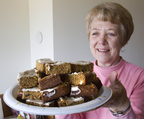 Paul Fraughton  |  The Salt Lake Tribune
Joan Ogden holds a plate of  molasses bars made from her mother's recipe.