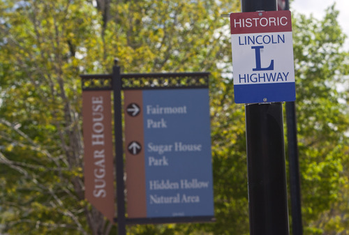 Chris Detrick  |  The Salt Lake Tribune
A newly placed Historic Lincoln Highway sign at the Sugarhouse Monument Tuesday May 7, 2013. Students from Hawthorne Elementary School and members of the Utah Lincoln Highway Association placed a historic Lincoln Highway marker at the Sugarhouse Monument to celebrate what was the first U.S. transcontinental highway going through the area.