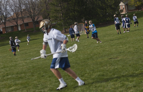 Chris Detrick  |  The Salt Lake Tribune
Members of the Skyline lacrosse team practice at Highpoint Park in Cottonwood Heights DOW} May 3, 2013.