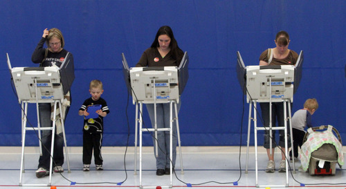 Rick Egan  | Tribune file photo

Kids stand by as their parents vote at Pony Express Elementary School in Eagle Mountain, Tuesday, November 6, 2012.