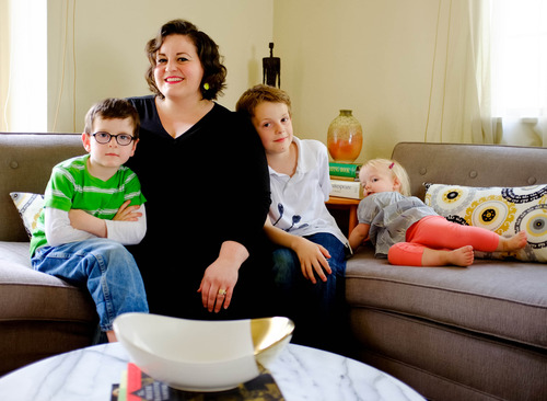 Trent nelson  |  The Salt Lake Tribune
Blogger Carina Wytiaz, with children James, William and Lucy in Provo, says a clean house is sure to cheer up any mom.
