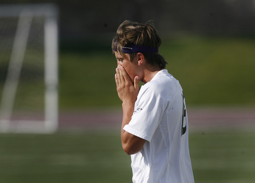 Scott Sommerdorf   |  The Salt Lake Tribune
At the final whistle, Brandon Perry of Desert Hils reacts to the loss to Park City. The MIners defeated Desert Hills 2-1 in the 3A boys' soccer state semifinal, Friday, May 10, 2013. They advance to tomorrow's 3A final.