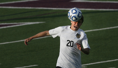 Scott Sommerdorf   |  The Salt Lake Tribune
David Brown of Wasatch heads the ball during first half play. Wasatch beat Ogden 2-1 in OT in the 3A boys' soccer state semifinal at the half, Friday, May 10, 2013.