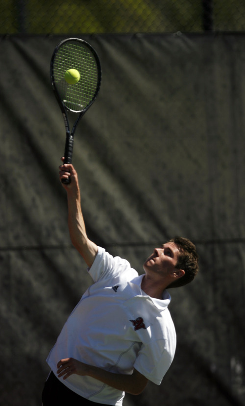 Francisco Kjolseth  |  The Salt Lake Tribune
Carston Henderson of Northridge serves up a shot in the first round of 3rd Singles during the 5A state tennis tournament at Liberty Park on Friday, May 10, 2013. .