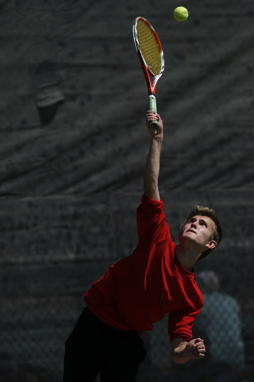 Francisco Kjolseth  |  The Salt Lake Tribune
Devin Richie of West High serves one up alongside his doubles partner Daniel Liu in 1st Doubles in the 5A state tennis tournament at Liberty Park on Friday, May 10, 2013.