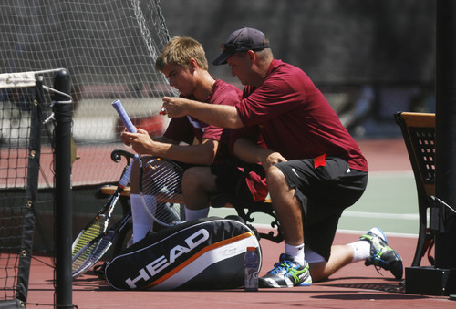 Francisco Kjolseth  |  The Salt Lake Tribune
Sam Tullis of Viewmont talks with his dad Matt Tullis, playing the role of assistant coach in the second round of 1st Singles during the 5A state tennis tournament at Liberty Park on Friday, May 10, 2013.