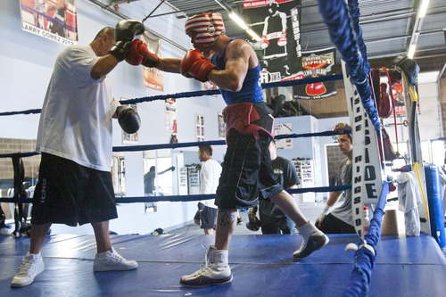 Chris Detrick  |  The Salt Lake Tribune
Larry Gomez, 20, trains with Coach Gomez at K.O. Boxing Gym Tuesday May 7, 2013. Gomez will be competing in the National Golden Gloves boxing tournament.