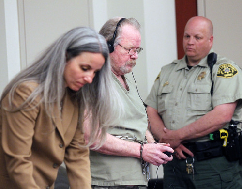 Al Hartmann  |  The Salt Lake Tribune
Defense attorney McCaye Christensen stands with client Dennis Lambdin in a sentencing hearing Monday May 13. Lambdin was convicted of first-degree felony murder in the 2009 slaying of his wife, Touch Lambdin, at their Cottonwood Heights home.