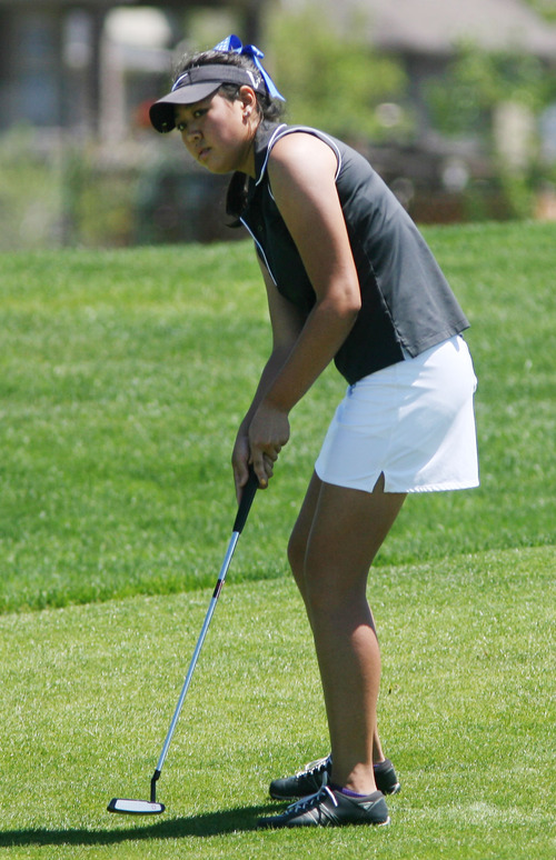 Steve Griffin | The Salt Lake Tribune


Bingham's Sirene Blair putts for an eagle on the sixth hole during the 5A girl's golf championships at Glen Eagle Golf Course  in Syracuse, Utah Monday May 13, 2013.