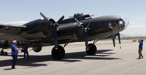 Al Hartmann  |  The Salt Lake Tribune
Folks take in the B-17 Flying Fortress Memphis Belle at the South Valley Regional Airport in West Jordan on Monday, May 13.