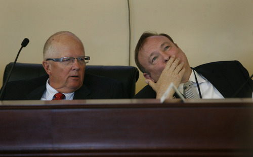 Scott Sommerdorf   |  The Salt Lake Tribune
Sen. Jim Dabakis, D-Salt Lake City, right, reacts after he was accused of "bloviating" by a fellow senator, Scott Jenkins, R-Plain City. Rep. Mike Noel, R-Kanab, left, later defended Dabakis, saying that despite their political differences, he appreciates Dabakis' perspective. The Legislature's Government Operations Interim Committee discussed a proposal from Sen. Todd Weiler to make the office of attorney general appointed rather than elected in the wake of the scandal currently engulfing Attorney General John Swallow. Wednesday, May 15, 2013.