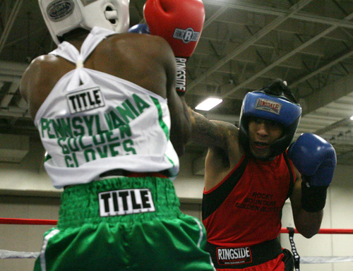 Steve Griffin | The Salt Lake Tribune


Utah's Francisco Lopez, throws a right hand at Jashua Jones, of Pennsylvania, during Golden Gloves boxing tournament at the Salt Palace Convention Center in Salt Lake City, Utah Tuesday May 14, 2013. Lopez lost to Jones.
