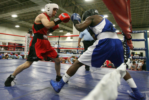 Steve Griffin | The Salt Lake Tribune


Utah's Isaac Aguliar, left, battles Sharone Carter, of St. Louis, during Golden Gloves boxing tournament at the Salt Palace Convention Center in Salt Lake City, Utah Wednesday May 15, 2013. Aguliar defeated Carter.