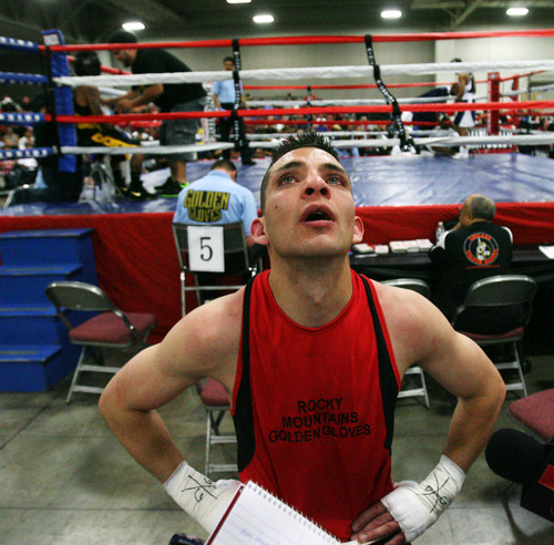 Steve Griffin | The Salt Lake Tribune


With tears in his eyes an emotional Isaac Aguliar, of Salt Lake City,  talks about his victory over Sharone Carter, of St. Louis, during Golden Gloves boxing tournament at the Salt Palace Convention Center in Salt Lake City, Utah Wednesday May 15, 2013.