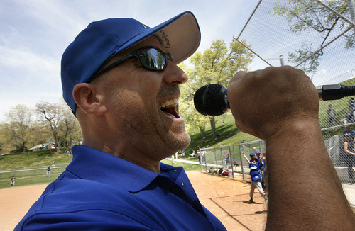 Scott Sommerdorf   |  The Salt Lake Tribune
Manager of The Avenues Sharks team, Sean Barnett sings "Take Me Out to the Ballgame" prior to the first game, Saturday, May 11, 2013. The Avenues Baseball League kicked off its season. Salt Lake County Mayor Ben McAdams threw out the first pitch.