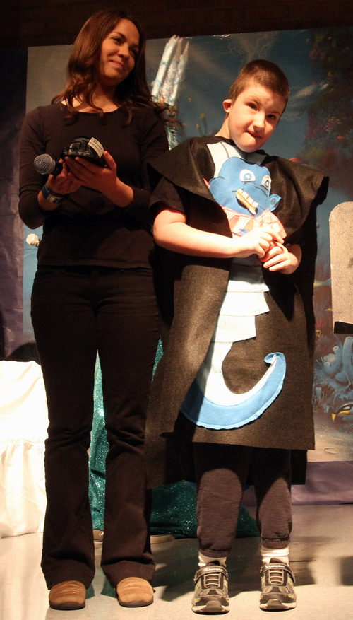 Rick Egan  | The Salt Lake Tribune 

Emily Sosa (left) and Alex Carter, as Seahorse, in the Jordan Valley School, production of "The Little Mermaid" Thursday, January 25, 2013.