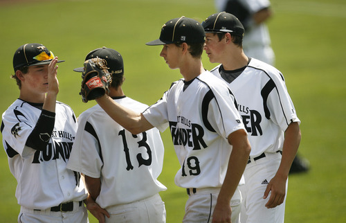 Scott Sommerdorf   |  The Salt Lake Tribune
Desert Hills' Baden Powell gets congratulations from team mates after he comes off the field after closing out an inning versus Carbon. He got the win as they won 2-0 to advance in the 3A playoffs, Thursday, May 16, 2013.