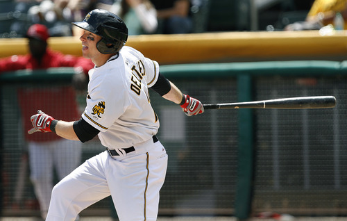 Scott Sommerdorf   |  The Salt Lake Tribune
Bees DH Trent Oeltjen follows the flight of a hit versus the Nashville Sound, Sunday, May 19, 2013. Oeltjen is the latest in a growing line of minor and major leaguers to hail from Australia.