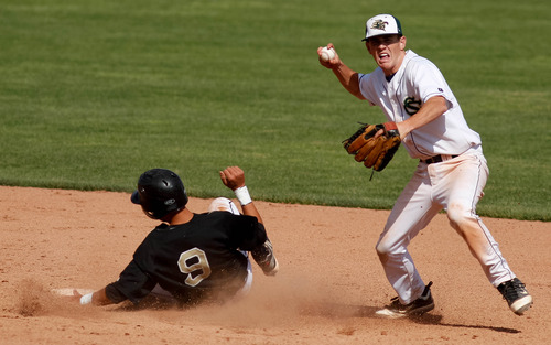 Trent Nelson  |  The Salt Lake Tribune
Snow Canyon's Chandler Day looks for the double play as Desert Hills' Dylan File slides into second. Snow Canyon defeated Desert Hills High School for the 3A boys baseball state championship in Orem Saturday May 18, 2013.