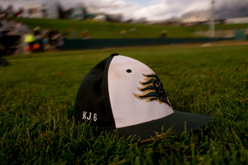 Trent Nelson  |  The Salt Lake Tribune
Snow Canyon players honored their fallen teammate Kreg "K.J." Harrison, who drowned last year, with his initials and number on their caps. Snow Canyon defeated Desert Hills High School for the 3A boys baseball state championship in Orem Saturday May 18, 2013.