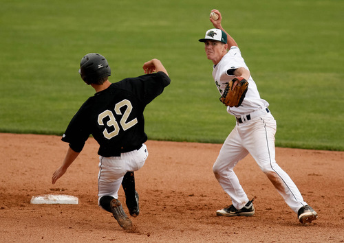 Trent Nelson  |  The Salt Lake Tribune
Snow Canyon's Chandler Day turns the double play with Desert Hills' Bryce Gibson sliding into second base as Snow Canyon defeated Desert Hills High School for the 3A boys baseball state championship in Orem Saturday May 18, 2013.