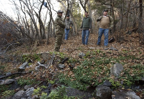 Leah Hogsten  |  The Salt Lake Tribune
l-r DEA and Narcotics Task Force agents, Rodney Holliday, Brian Lacy, Cliff Lark and Brian Bairett stand near the water source that fed a marijuana grove of more than 4,200 plants in Iron County, Thursday, November 1, 2012. Clothing, boots, backpacks and hygiene items littered the area. Cooperation among federal agents, prosecutors and county sheriffs coupled with a drought have helped reduce the amount of marijuana grown in Utah primarily by the La Familia cartel from Michoacan, Mexico, the primary grower in Utah.